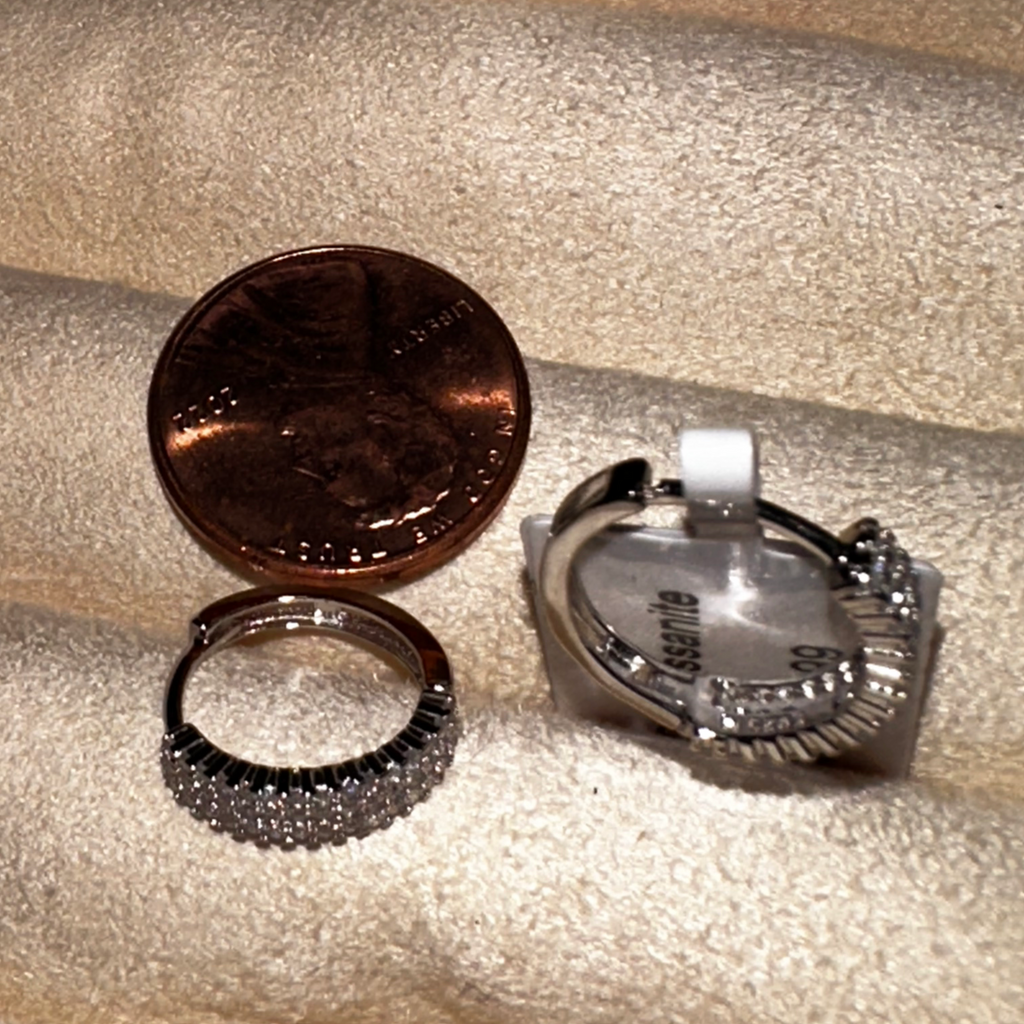 Close-up of three rings on a textured surface