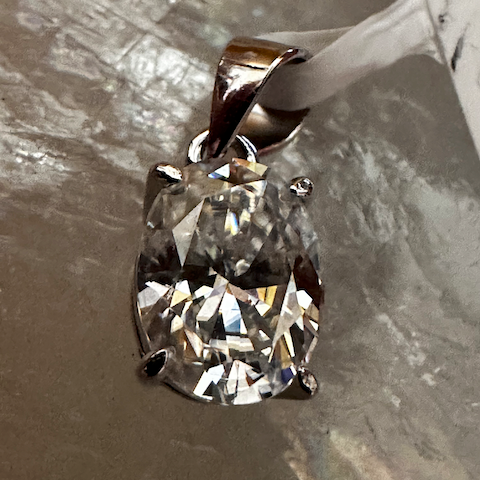 Diamond ring on a reflective surface