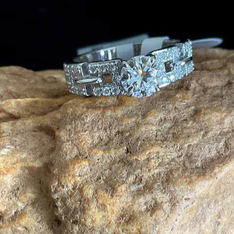 Diamond ring on a textured stone surface