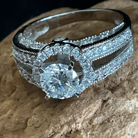 Diamond ring on a stone surface