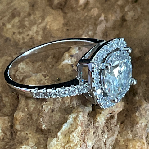 Diamond ring on a textured stone surface